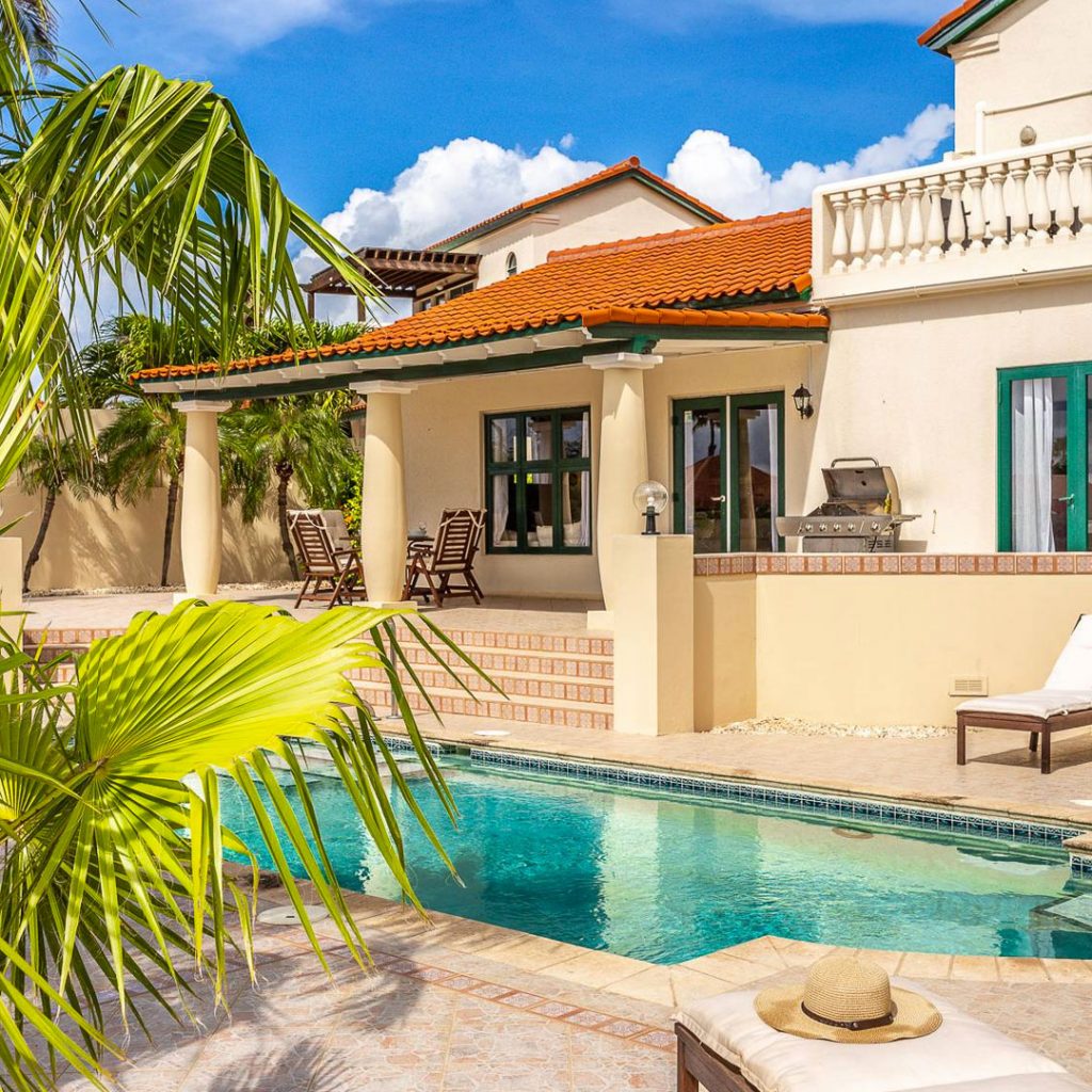 covered patio and pool