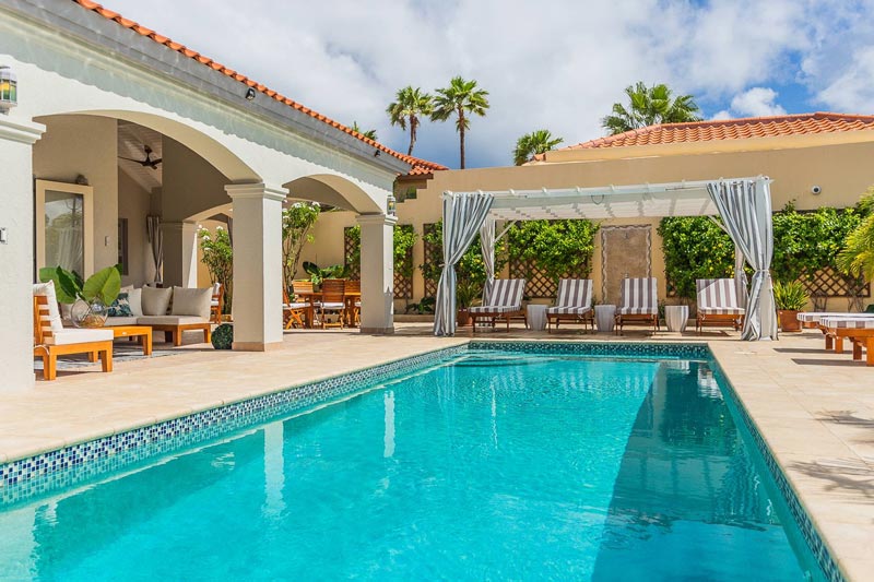 backyard with large pool and seating