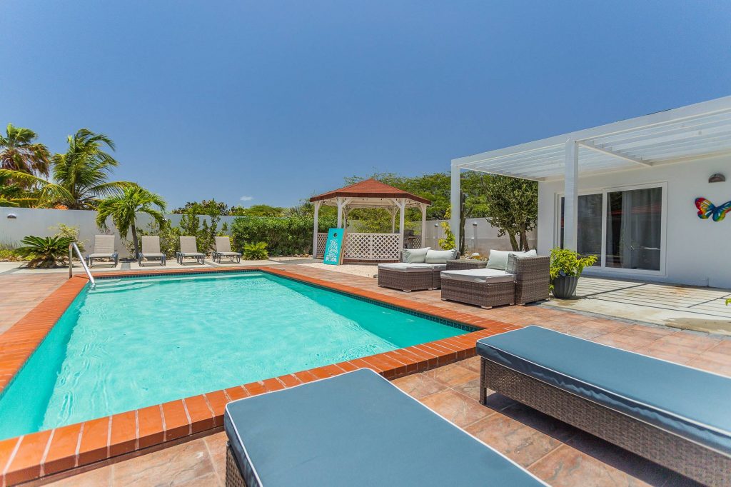 backyard with pool and seating