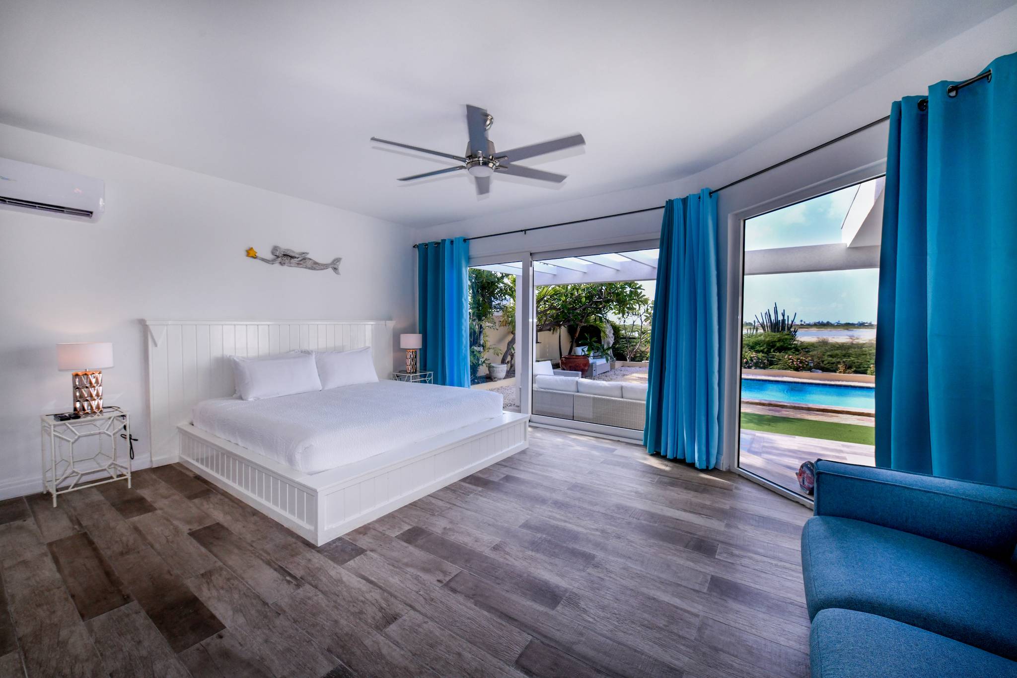 bedroom with blue curtains