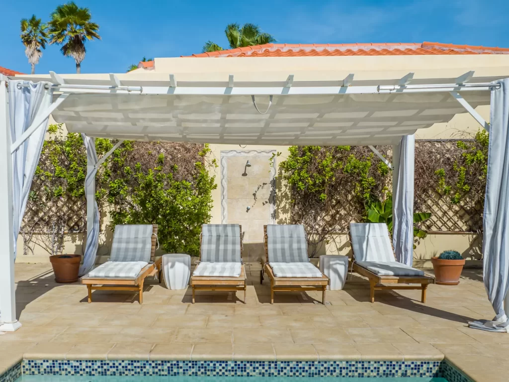 Lounge chairs by pool