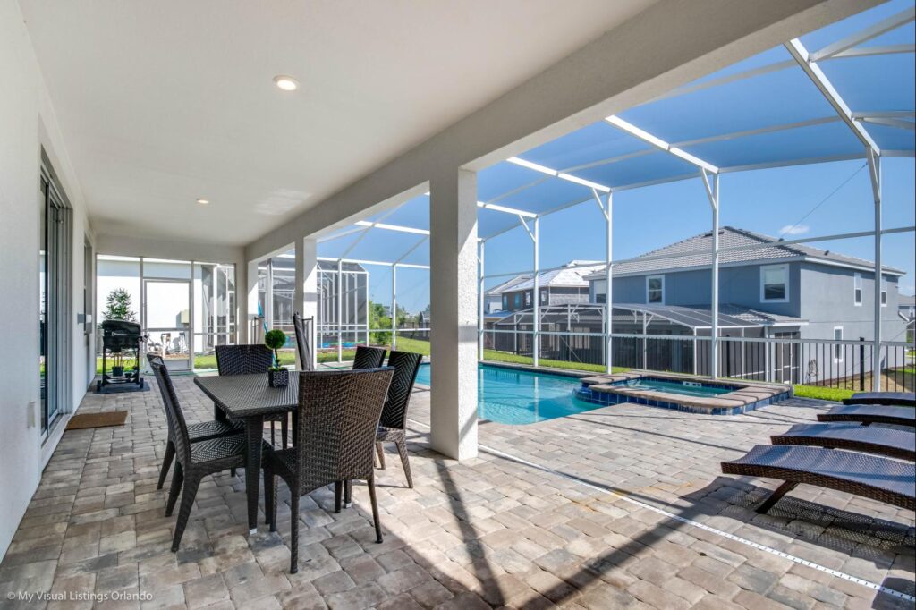 Interior pool with a table and chairs next to it.